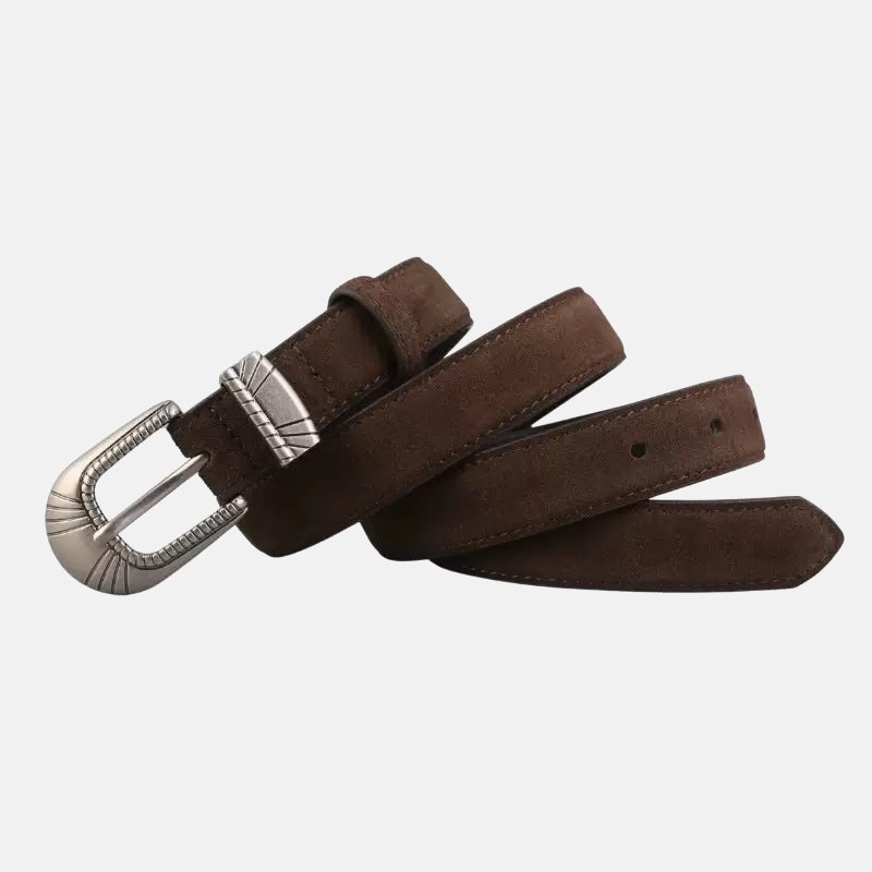 THE BELT worn over navy trousers