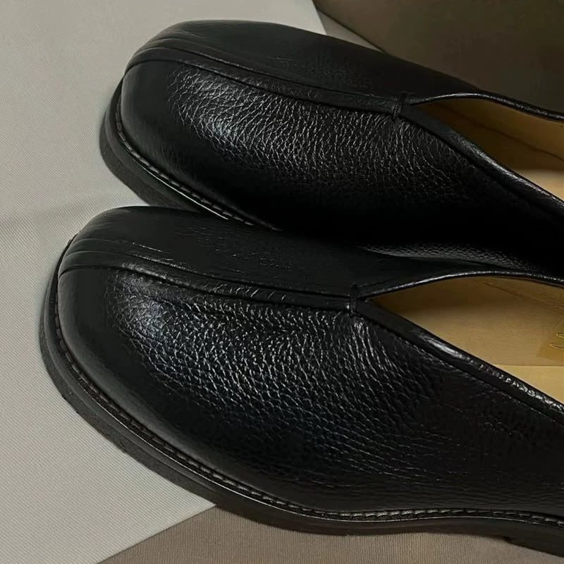 MONK square-toe slip-on in black, side view